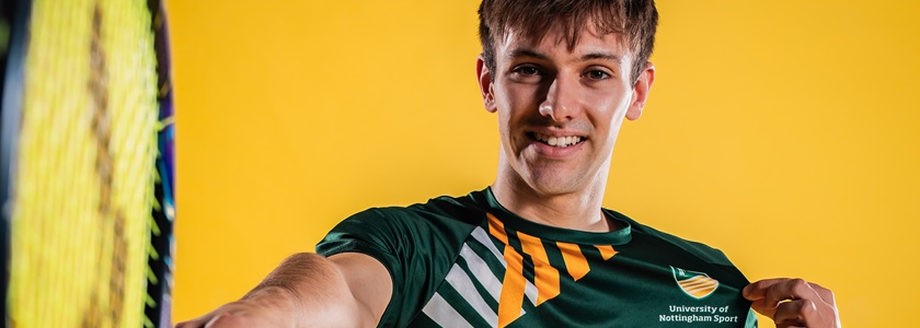 A University of Nottingham badminton athlete poses for a photograph