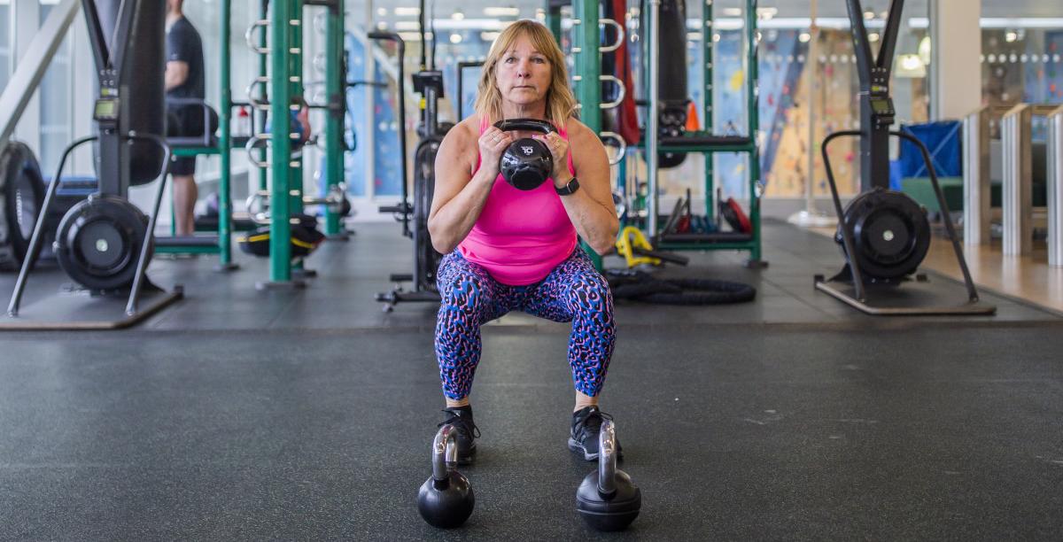 Female lifting free weights at David Ross Sports Village