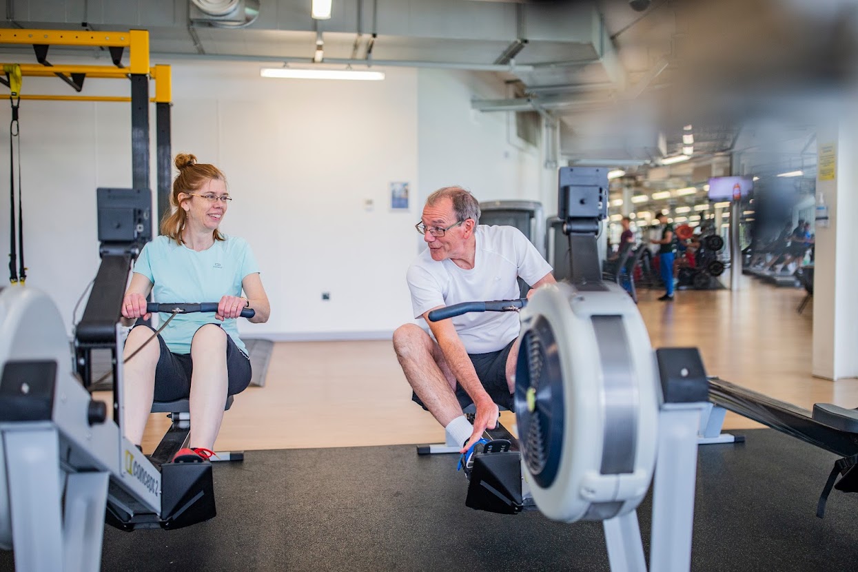 Two people training in our state-of-the-art fitness suite at David Ross Sports Village