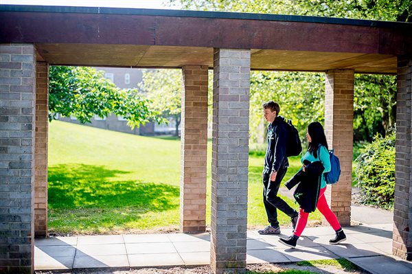 Students walking past Cavendish Hall, University Park