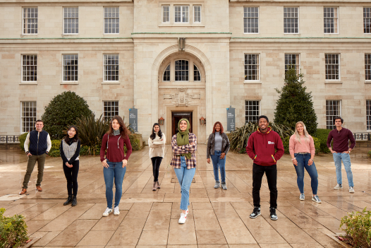 Group of students stood outside the historic Trent Building