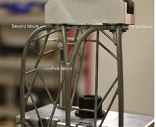 An engineering model with a weight on it