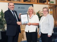 Carole Mallia receiving a teaching award