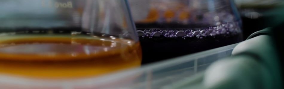 Two flasks containing dye