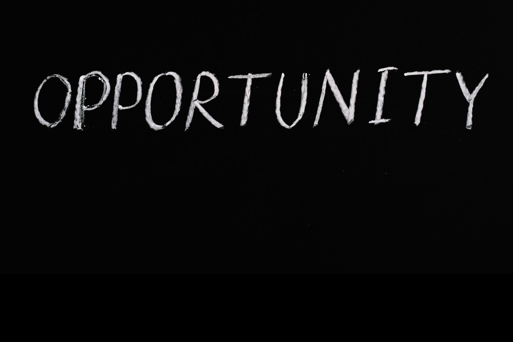 The word "Opportunity" written in chalk on blackboard