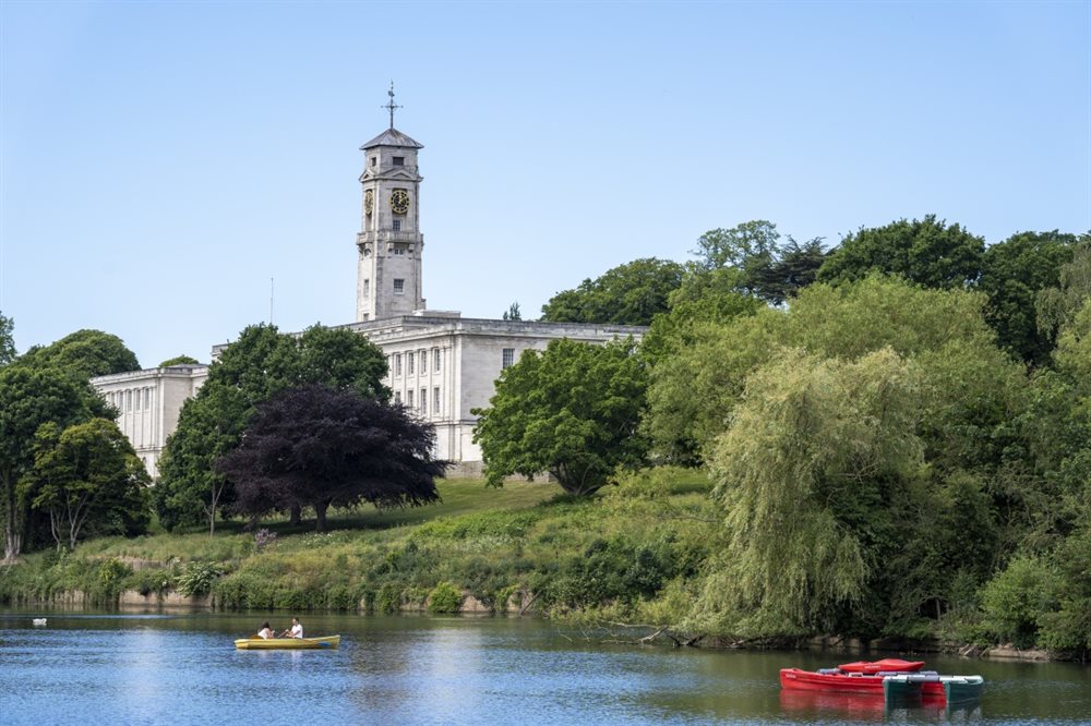 Trent building and Highfields lake with clear blue sky