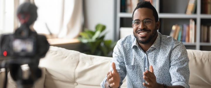 A man recording a video blog.