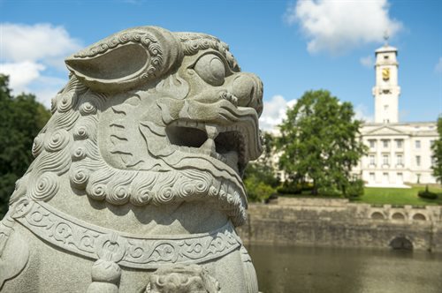 University of Nottingham China Campus, Ningbo. Stone lion sculpture in foreground.