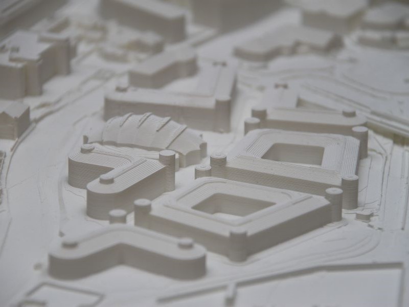 Miniature model of the University of Nottingham's Castle Meadow Campus on a projected augmented relief model