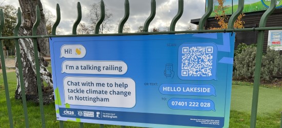 A sign at University Park that has information about the talking railing