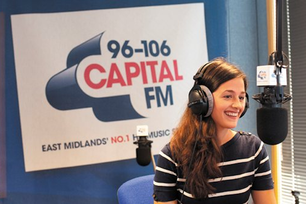 Student in studio presenting radio programme