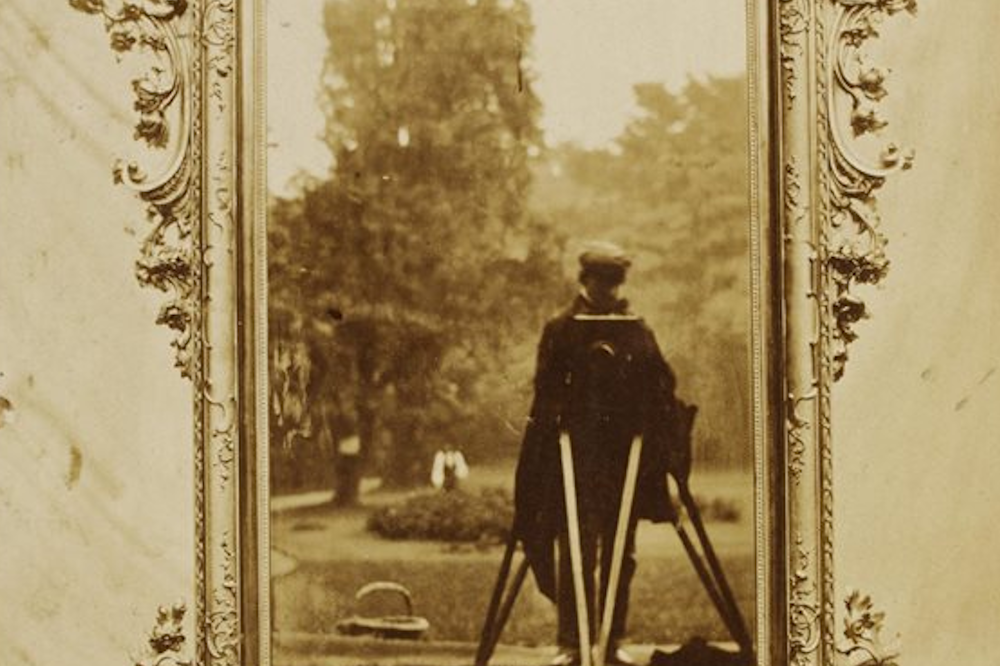 Old sepia photo of 19th century Venetian mirror