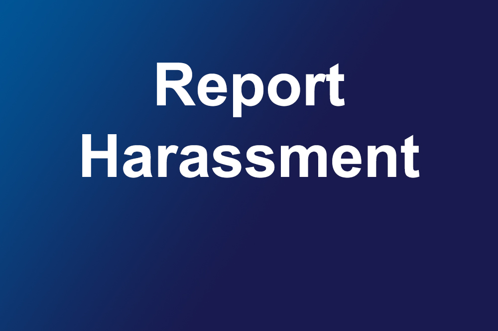 'Report harassment' on a blue background