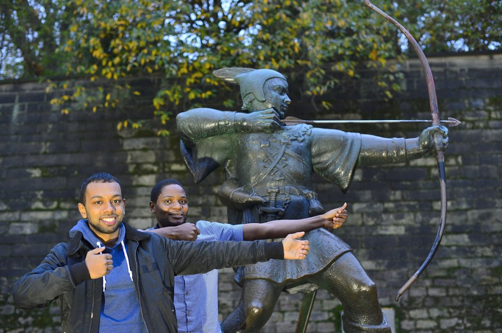 Close-up of hands using a touch-screen tablet