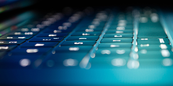 blue lit up computer keyboard