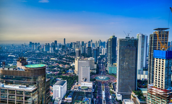 Photo of the Jakarta, Indonesia city skyline at dusk.