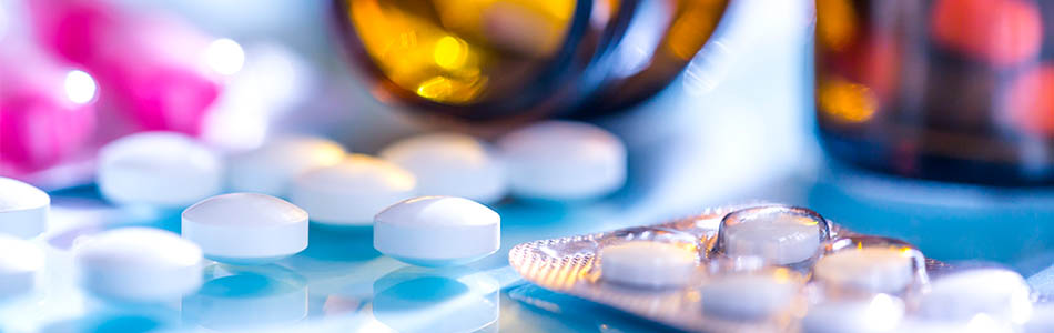 Medicine spilled over a worktop