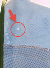 torn sling with hightlighted area