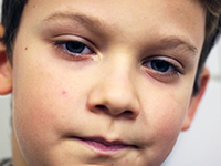 A child expressing disgust