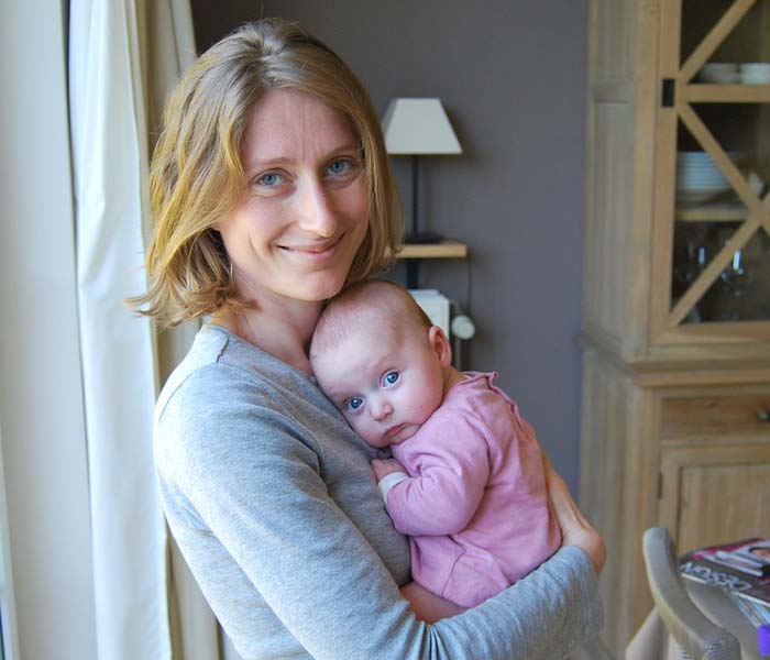 Father and baby looking at one another with love