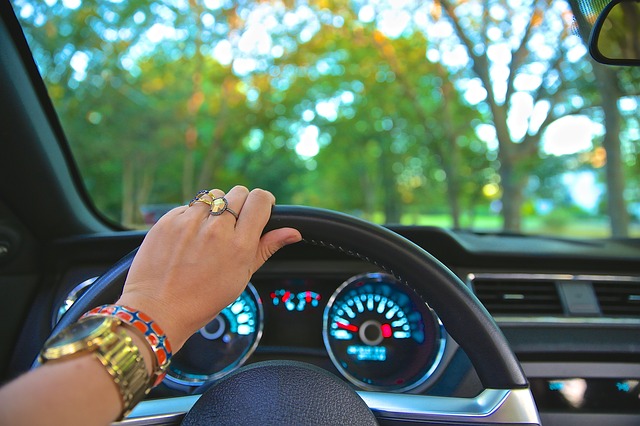 Picture of a being driven and the car dashboard