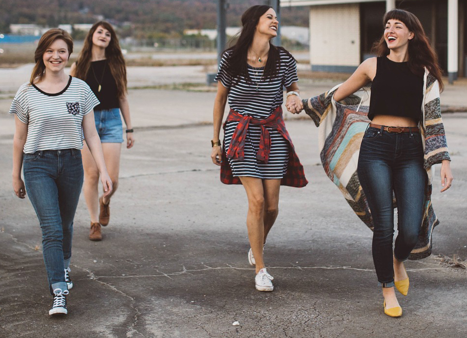 A group of teenage girls walking together.