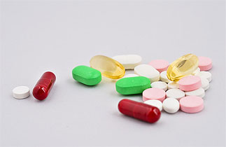 Prescription drugs linked image of collection of tablets