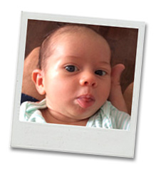 Babies face with tongue stuck out