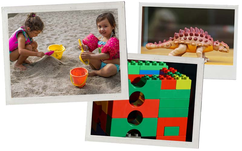 Two four year old girls with toys