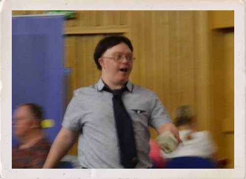 The face of young man with Down's Syndrome