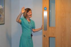 Audiologist waving goodbye