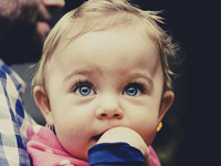 A child looking interested