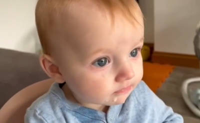 Baby dribbling milk from their mouth