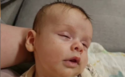 Baby looking milk drunk