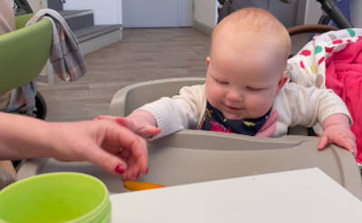 Baby pushing food away