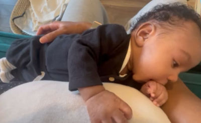 Baby sucking their fist