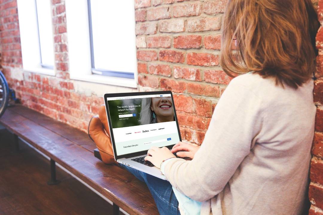 Woman browsing internet on laptop