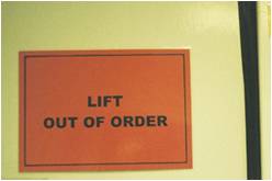 Out of order sign on lift door.