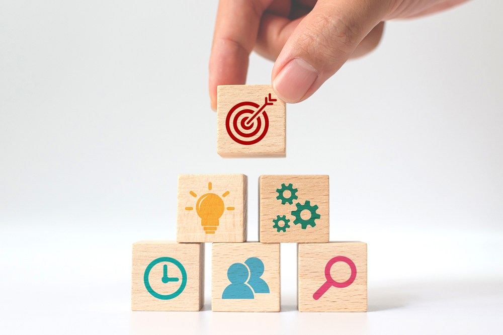 Building blocks representing meeting goals over time