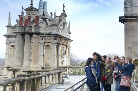 Group of students looking at a historical building.
