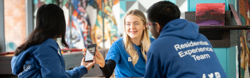Three student ambassadors planning a session