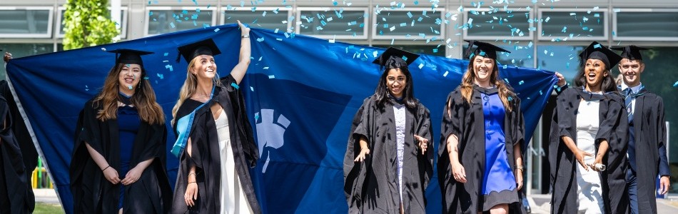 Graduates celebrating on University Park