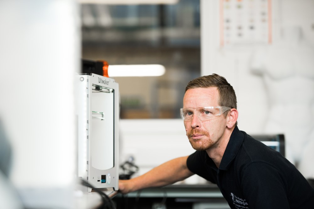 A male technician working in an Engineering workshop