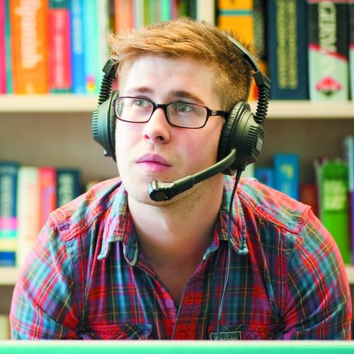 Student wearing headset in language centre