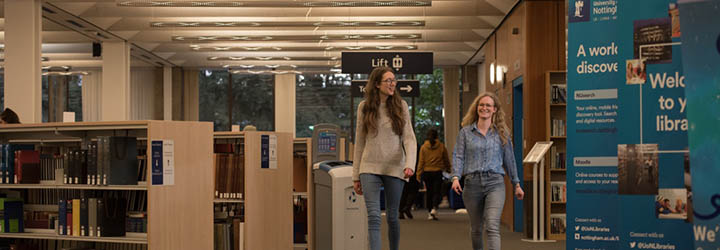 Students walking through Hallward Library