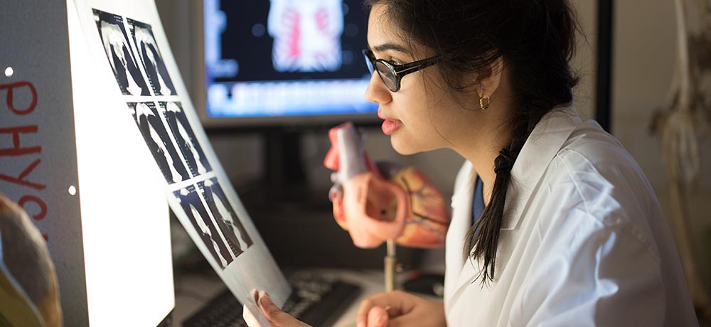 Female undergraduate studying X-rays, Anatomy Suite