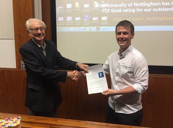 Scott winning the thesis prize
