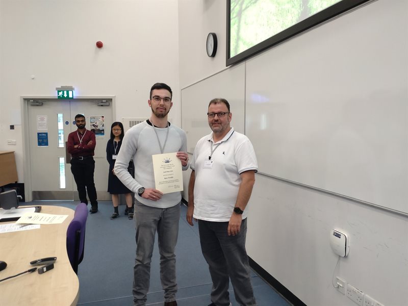 PhD student Reece Franklin receiving the Seah Award at the UKSAF Summer Meeting 2024 for best overall presentation.