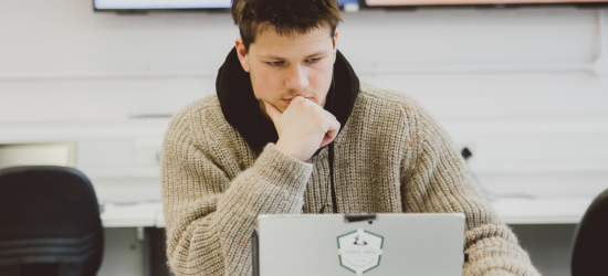 Student looking at laptop screen