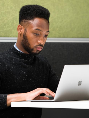 Student looking at laptop screen